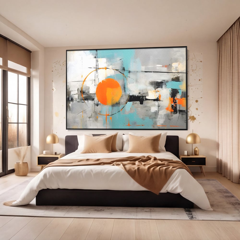 Tablou canvas cu pictura abstracta cu cerc portocaliu, in rama de aluminiu negru, pe perete intr-un dormitor